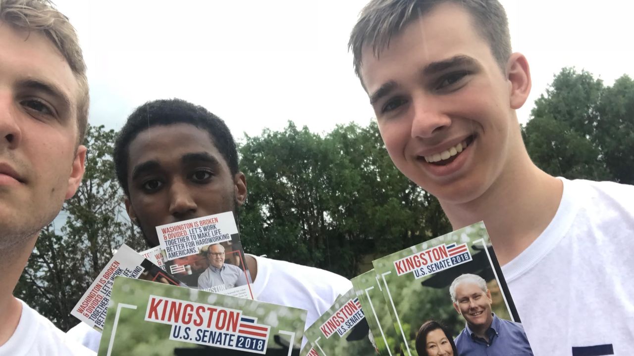 Mike Brodo and Ryan Doucette knock doors with a friend and volunteer for the Kingston for US Senate campaign in 2018.