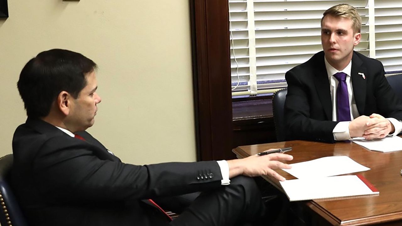 Gen z gop founder Mike Brodo talks with Sen. Marco Rubio