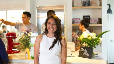 Luisa Santos, here in her store before the pandemic, says her government stimulus loan ran out long ago.