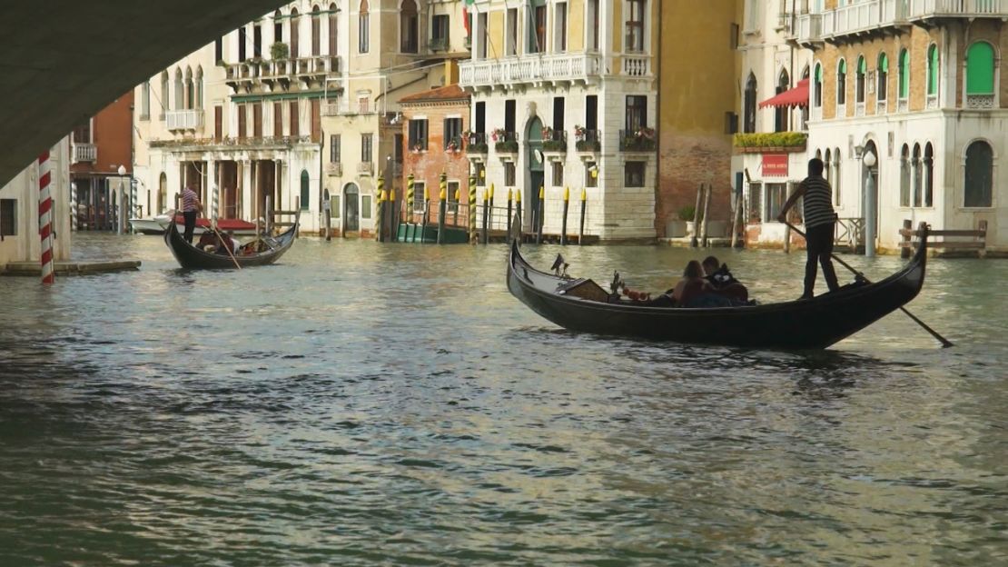 The canals of Venice saw much less traffic because of the pandemic and city residents said the water was clearer.