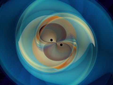 This is a simulation of two spiral black holes that merge and emit gravitational waves. 