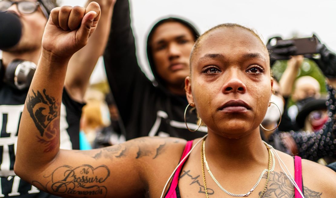 A demonstrator cries during a protest last year in Kenosha, Wisconsin.