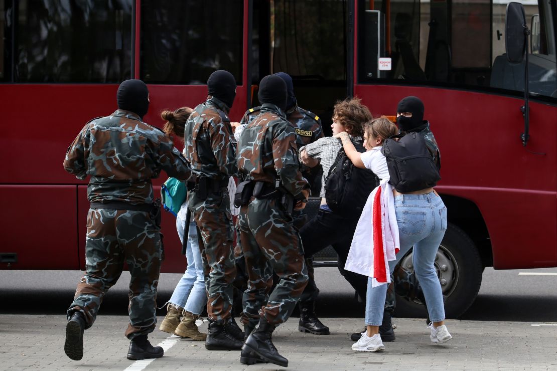 Security officers detain students during an anti-Lukashenko protest on Tuesday in Minsk. 