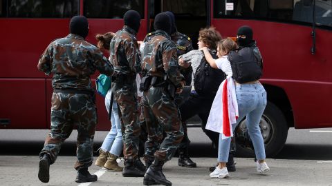 Security officers detain students during an anti-Lukashenko protest on Tuesday in Minsk.