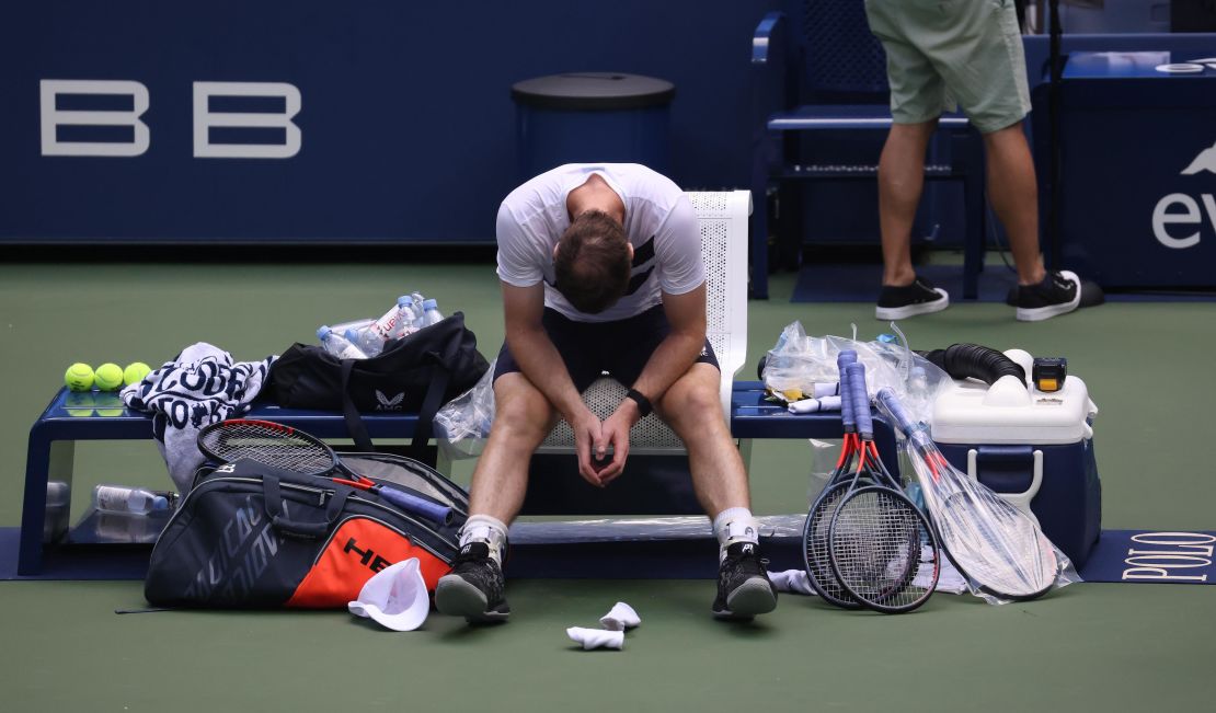 Andy Murray sits in his chair after seeing off Yoshihito Nishioka at the US Open. 
