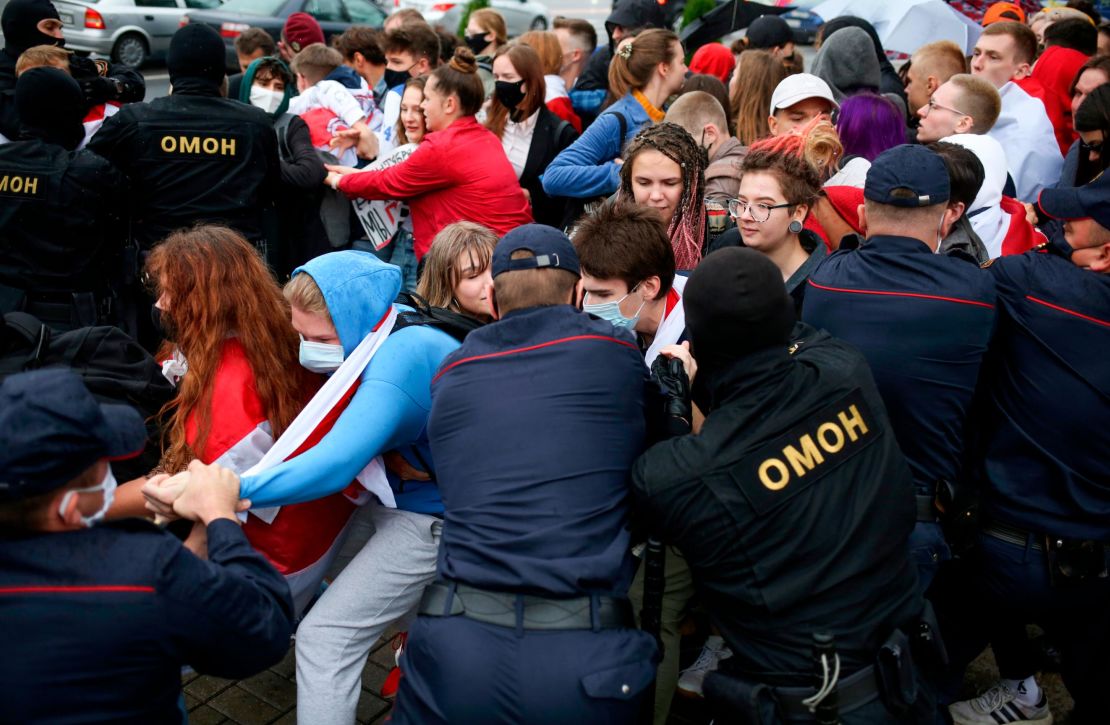 Police detain students during a protest in Minsk, Belarus, Tuesday, Sept. 1