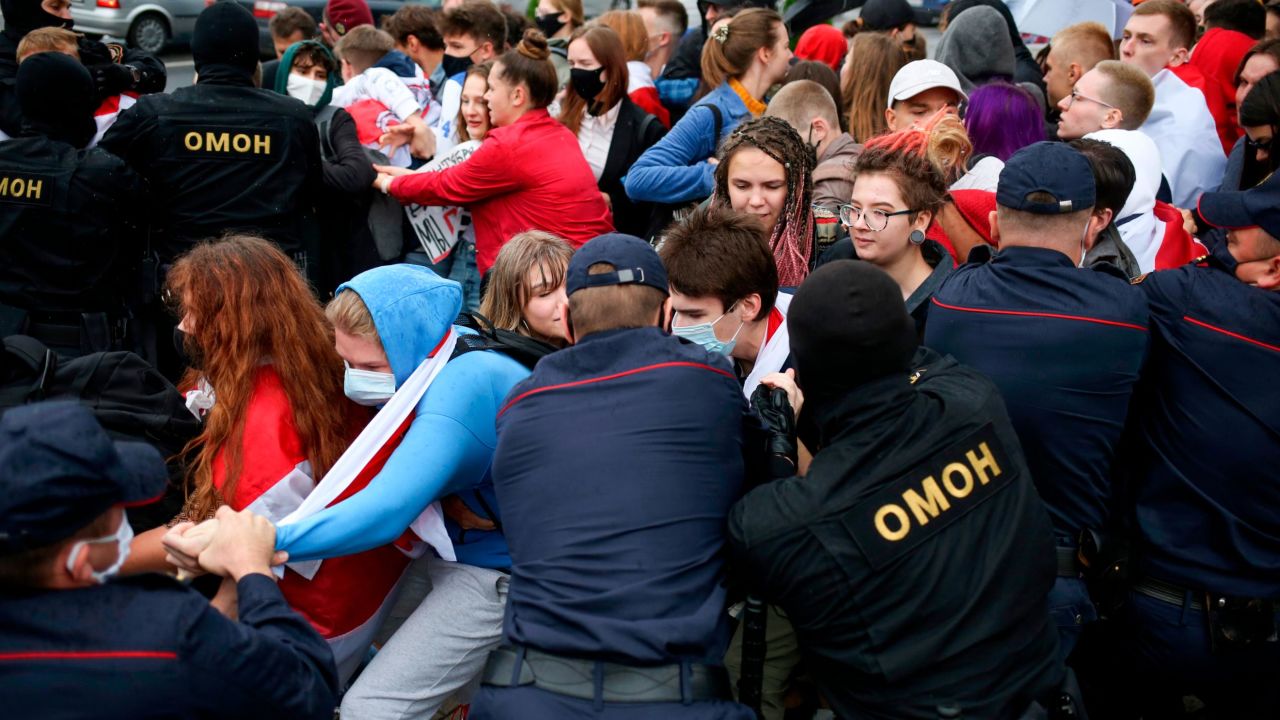 Police detain students during a protest in Minsk, Belarus, Tuesday, Sept. 1