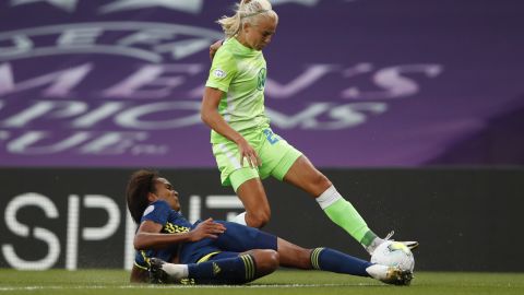 Harder is talked by Wendie Renard of Lyon during the UEFA Women's Champions League Final.