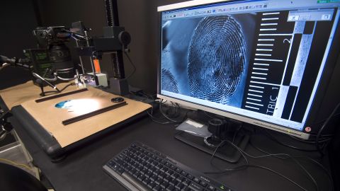 In this July 20, 2016, file photo, a fingerprint is enlarged for examination in the Latent Print Lab at the US Homeland Security Investigation Forensic Laboratory in Tysons Corner, Virginia.