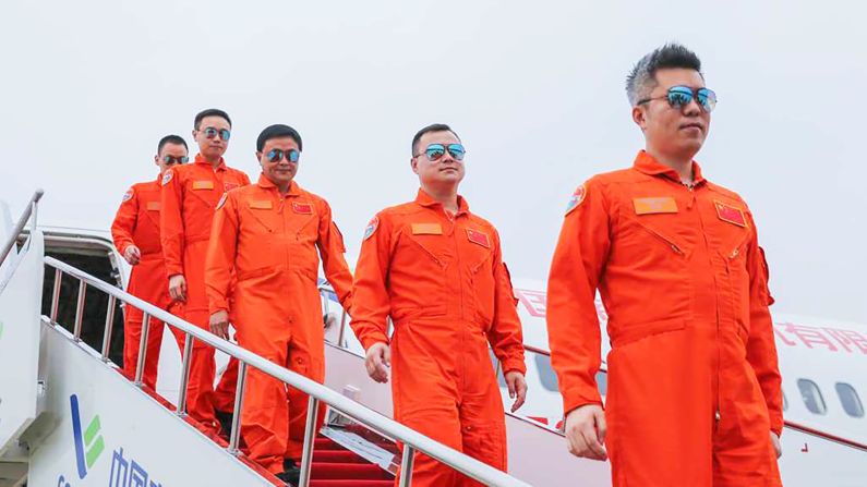 <strong>Flight testing: </strong>Test pilots emerging from the craft. Comac has built a fleet of six prototype versions of the C919 that have been pacing through a flight testing regime. 
