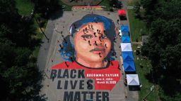ANNAPOLIS, MARYLAND - JULY 05: In an aerial view from a drone, a large-scale ground mural depicting Breonna Taylor with the text 'Black Lives Matter' is seen being painted at Chambers Park on July 5, 2020 in Annapolis, Maryland. The mural was organized by Future History Now in partnership with Banneker-Douglass Museum and The Maryland Commission on African American History and Culture. The painting honors Breonna Taylor, who was shot and killed by members of the Louisville Metro Police Department in March 2020. (Photo by Patrick Smith/Getty Images)