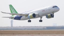 A Comac C919, the China's first medium-haul passenger jet aircraft, takes off from Pudong International Airport in Shanghai on December 17, 2017. The aircraft, in development by the Commercial Aircraft Corporation of China (Comac) in a bid to compete with Boeing's 737 and Airbus' A320 series of passenger jets, flew its second test flight to Shanghai on December 17, according to state media. / AFP PHOTO / - / China OUT (Photo credit should read -/AFP via Getty Images)