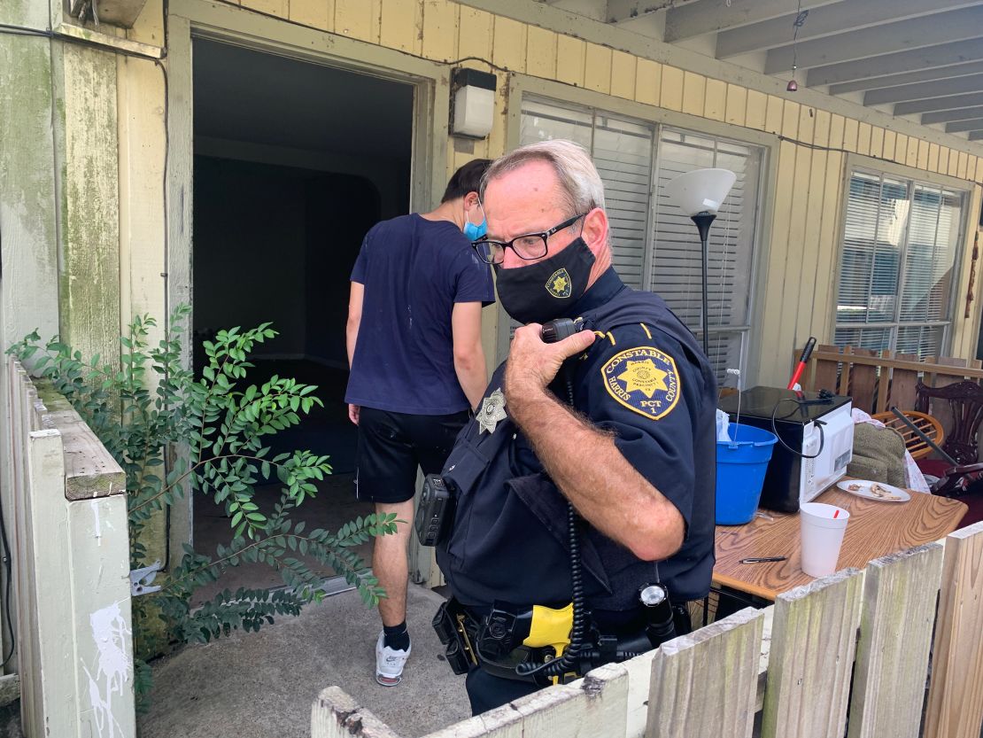 Deputy Bennie Gant with the Harris County Constable's Office executes a warrant.