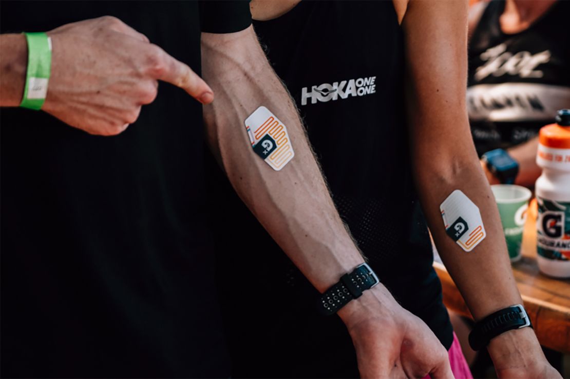 Gatorade's Gx Sweat Patch shown on an Ironman athlete during an event in Kona Hawaii. The Gx Sweat Patch, expected to launch in 2021, relays data about sweat and sodium level to an app that provides personalized hydration and nutrition recommendations.