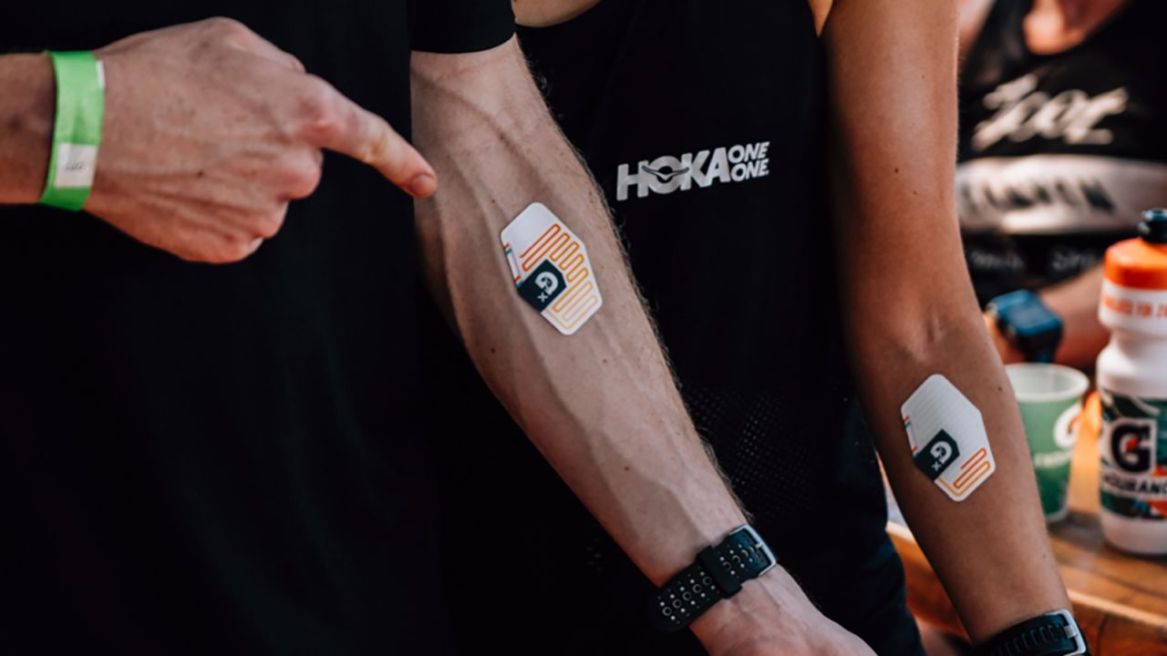 Gatorade's Gx Sweat Patch shown on an Ironman athlete during an event in Kona Hawaii. The Gx Sweat Patch, expected to launch in 2021, relays data about sweat and sodium level to an app that provides personalized hydration and nutrition recommendations.