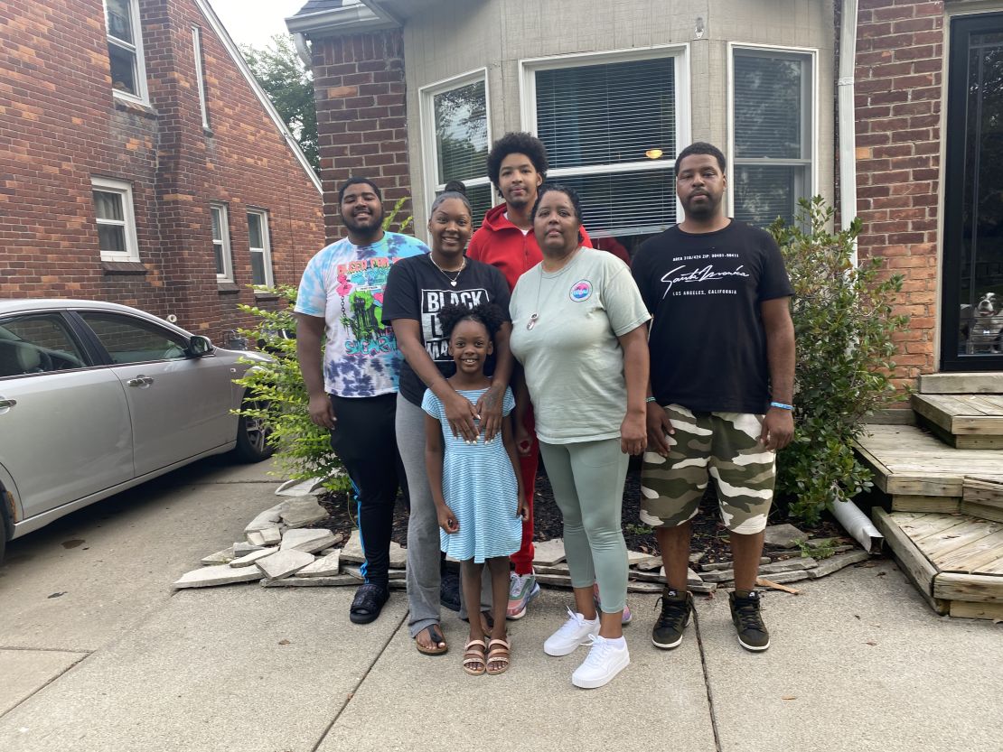 Keith Gambrell, right, stands next to his mother, Cheryl Fowler, and his brothers, sister and niece. The family lost two patriarchs within six hours.