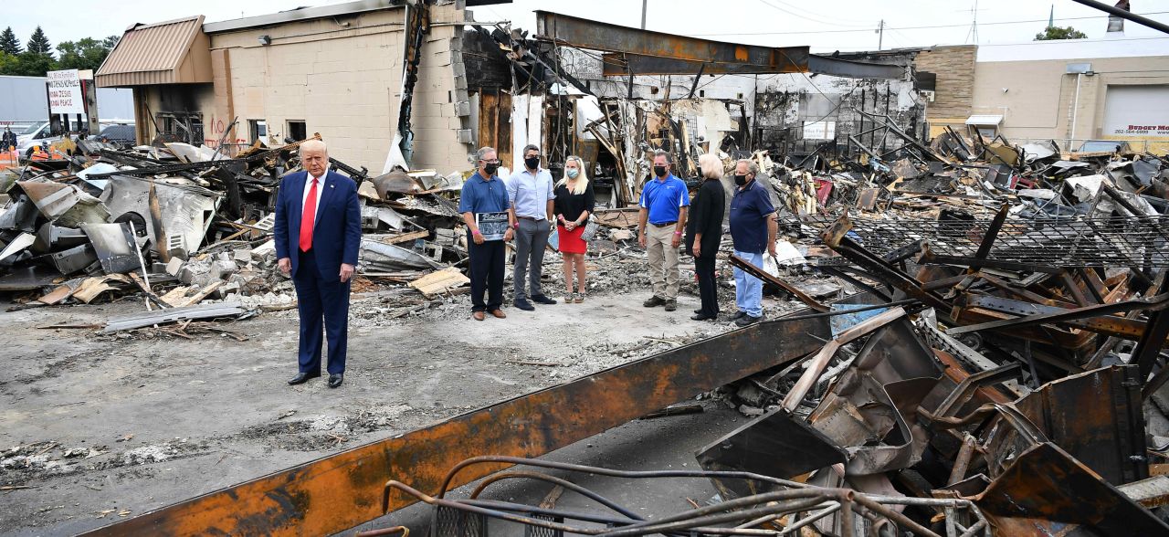 <a href="https://www.cnn.com/2020/09/01/politics/donald-trump-kenosha-wisconsin-visit/index.html" target="_blank">Trump tours</a> an area affected by civil unrest in Kenosha, Wisconsin, in September 2020.