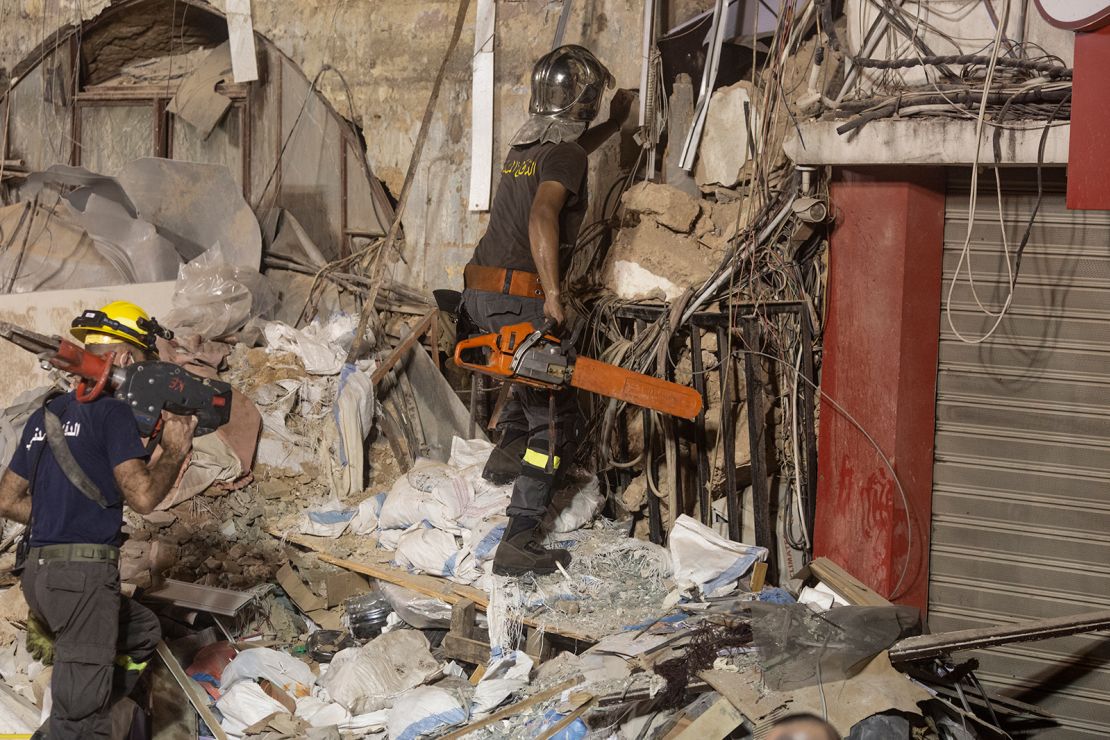 Rescue workers return to search a destroyed building with the aim of finding a potential survivor in the aftermath of the Beirut blast on September 4, 2020 in Beirut, Lebanon. 