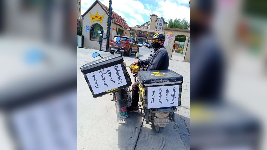 Some food delivery workers in Inner Mongolia have stuck signs reading "save our mother tongue" on their bikes.