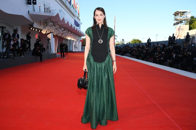 Amira Casar at the screening of the French film "Amants" (Lovers) in a Loewe ready-to-wear flower jacquard bib dress.