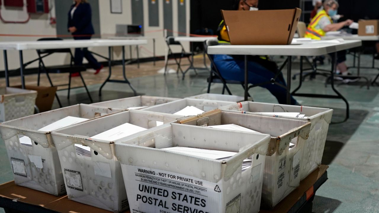Workers prepare absentee ballots for mailing at the Wake County Board of Elections in Raleigh, N.C., Thursday, Sept. 3, 2020. North Carolina is scheduled to begin sending out more than 600,000 requested absentee ballots to voters on Friday.