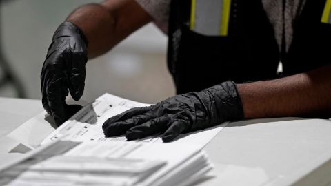 A workers prepares absentee ballots for mailing at the Wake County Board of Elections in Raleigh, N.C., Thursday, Sept. 3, 2020. North Carolina is scheduled to begin sending out more than 600,000 requested absentee ballots to voters on Friday.