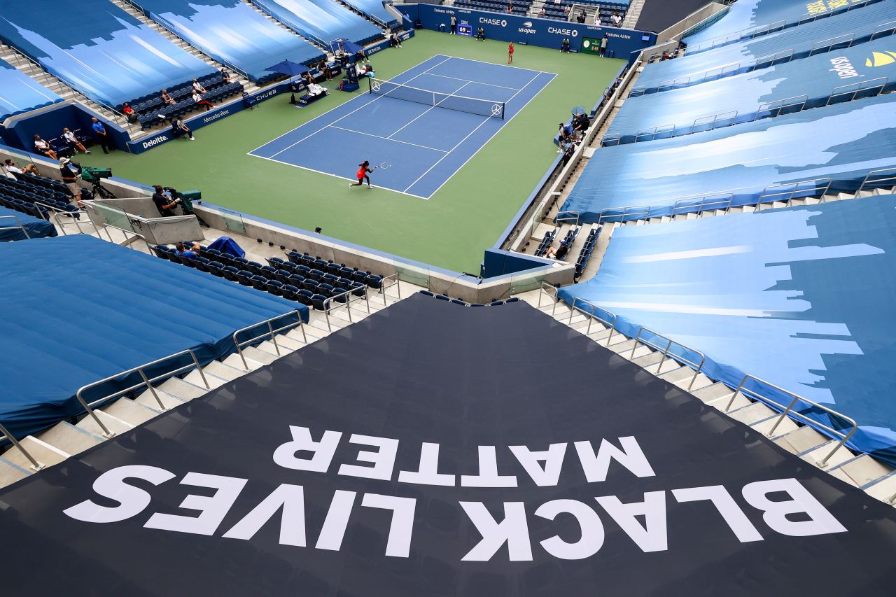 Black Lives Matter signage is seen in New York's Louis Armstrong Stadium as Cori Gauff plays against Anastasija Sevastova at the US Open.