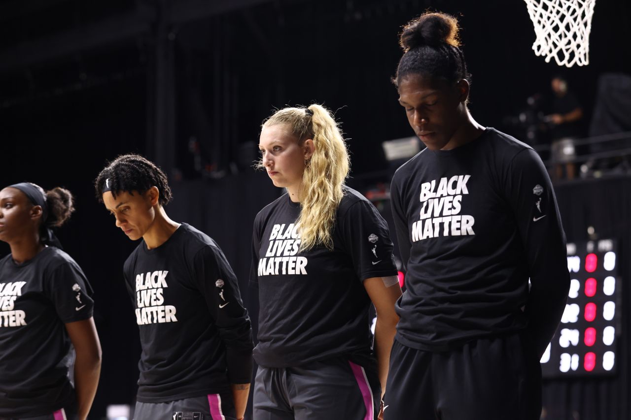 Members of the WNBA's Indiana Fever wear Black Lives Matter shirts before their game against the Chicago Sky on August 31.
