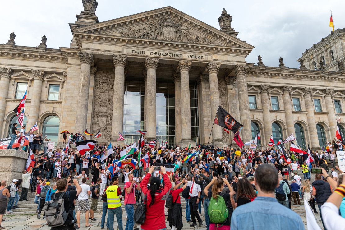 Protesters in Berlin last weekend held up imperial banners and QAnon signs.