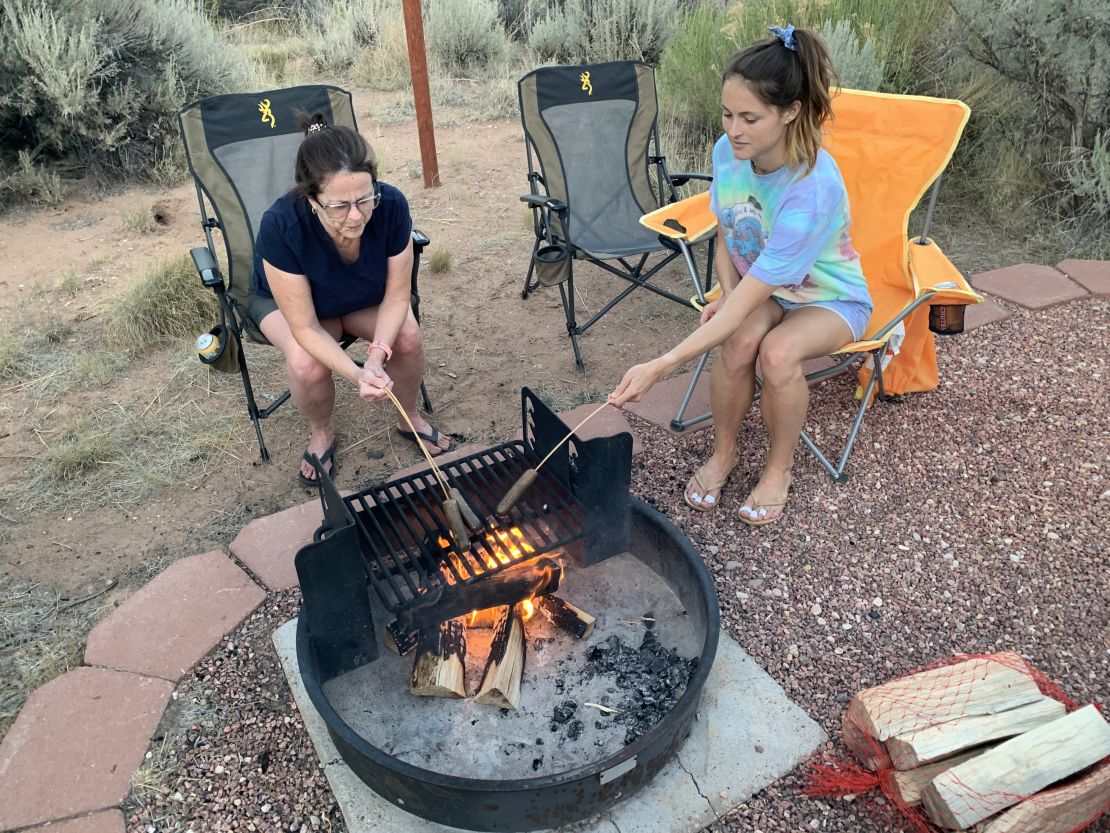 The author's wife, Julia, and daughter, Chelsea, roast sausages in Kodachrome Basin State Park's campground.