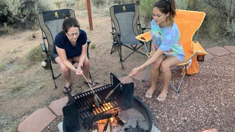The author's wife, Julia, and daughter, Chelsea, roast sausages in Kodachrome Basin State Park's campground.