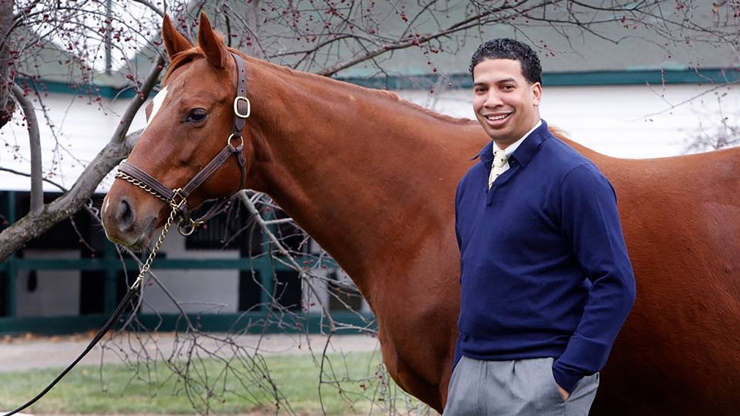 Greg Harbut, who owns a horse competing in Saturday's Kentucky Derby, poses with Grade 1 winner Tell a Kelly.
