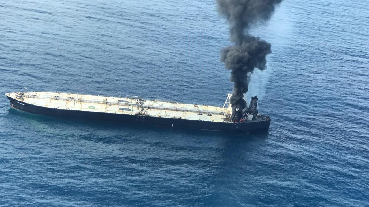 This photo released by Sri Lankan Air Force shows smoke rising after the fire broke out on board the New Diamond. 