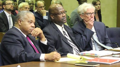 Curtis Flowers, center, sits with his attorneys, Henderson Hill, left, and Rob McDuff during a December 2019 bond hearing in Winona, Mississippi.