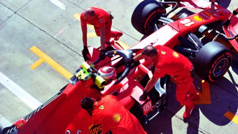 Charles Leclerc's car is returned to the garage.