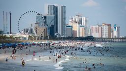 People enjoy the beach on September 5, 2020 in Myrtle Beach, South Carolina. The Labor Day weekend marks an end to a Covid-19 hampered summer tourist season. (Photo by Sean Rayford/Getty Images)