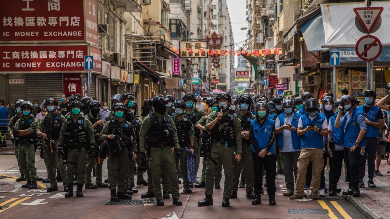 TOPSHOT - Police patrol the area after protesters called for a rally in Hong Kong on September 6, 2020 to protest against the government's decision to postpone the legislative council election due to the COVID-19 coronavirus, and the national security law. (Photo by DALE DE LA REY / AFP) (Photo by DALE DE LA REY/AFP via Getty Images)