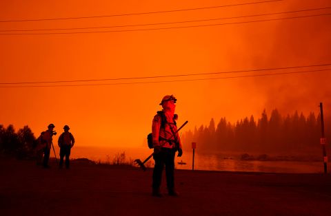 A firefighter watches the advancing Creek Fire in Shaver Lake.