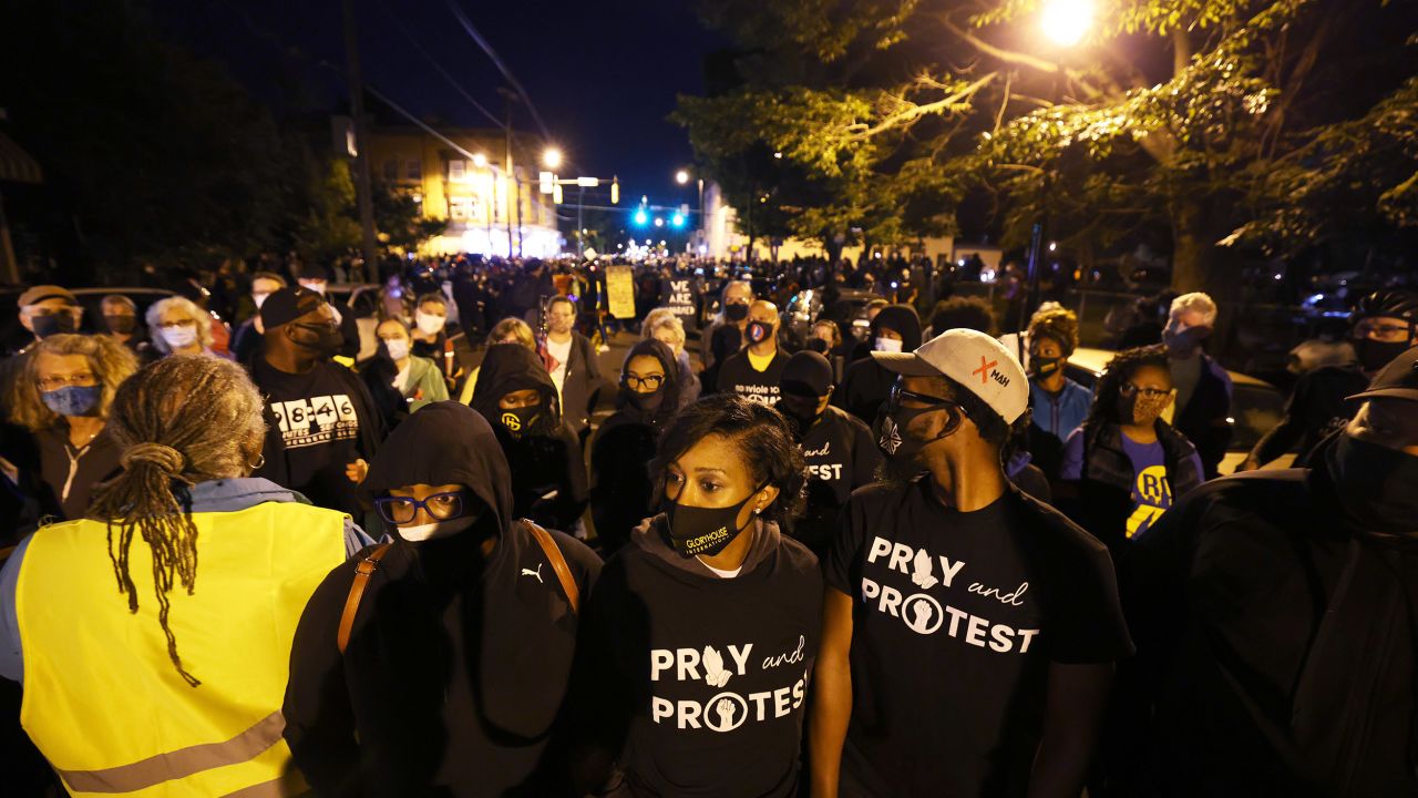 People prepare to march towards the Public Safety building for Daniel Prude on September 06, 2020 in Rochester, New York. Prude died after being arrested on March 23 by Rochester police officers who had placed a "spit hood" over his head and pinned him to the ground while restraining him. This is the fifth consecutive night of protesting since the family released bodycam footage of Mr. Prude's arrest.  (Photo by Michael M. Santiago/Getty Images)