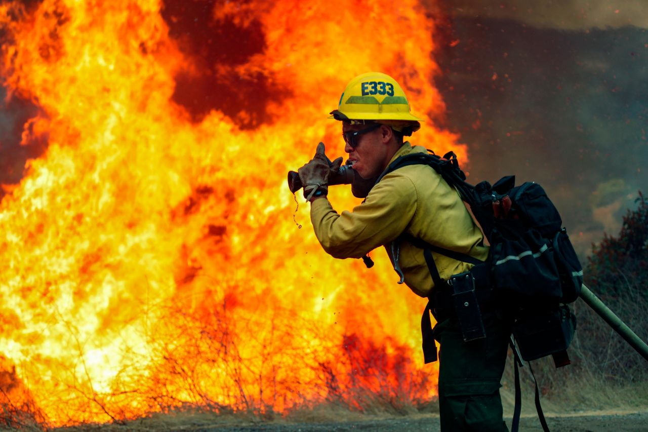 A firefighter in Jamul, California, battles the Valley Fire on September 6.