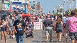 Thousands flocked to Ocean City to enjoy Labor Day. Visitors stroll the boardwalk Saturday, Sept. 5, 2020. Masks were required on the boardwalk during the holiday weekend.