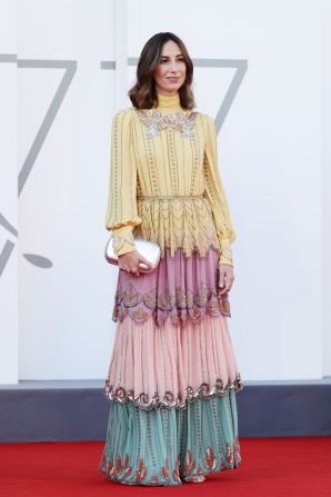 Director Gia Coppola in a tiered multi-color Gucci gown ahead of the premiere of her film "Mainstream," starring Maya Hawke, Colleen Camp and Andrew Garfield.