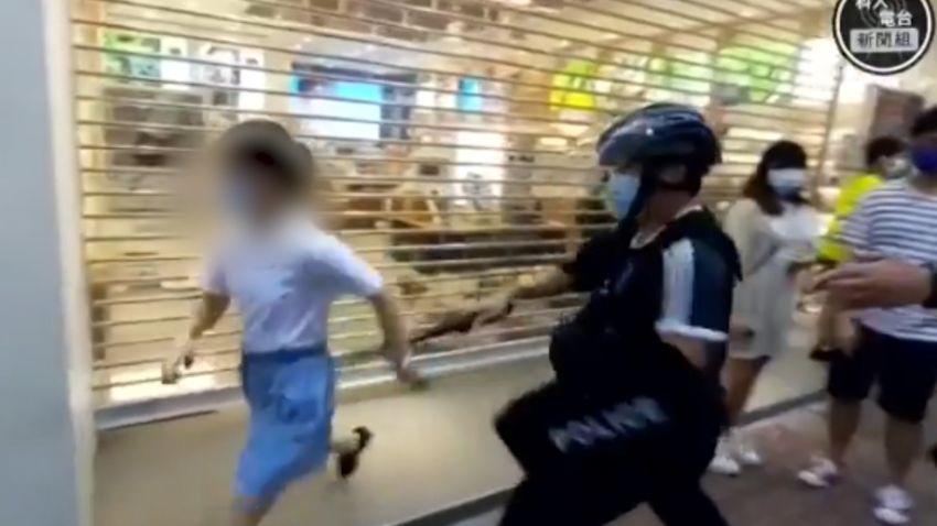 hong kong police tackle girl 2