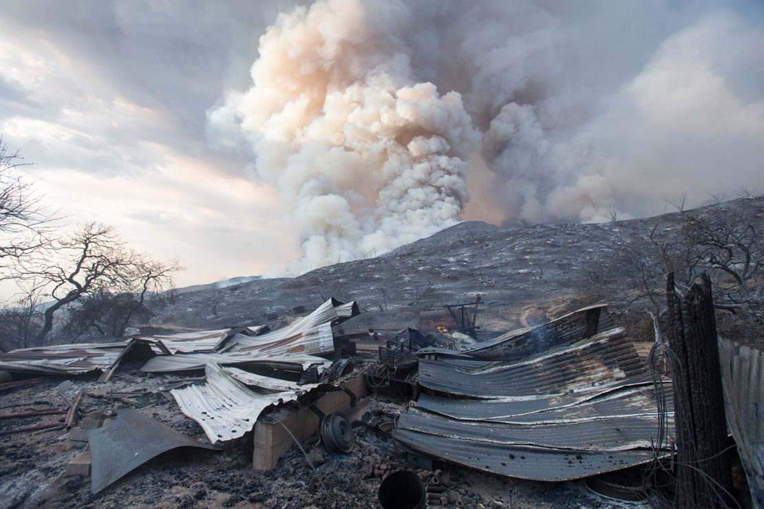 A burned structure is seen in the charred area hit by the El Dorado Fire.