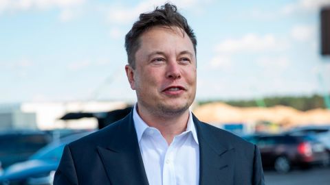 Tesla head Elon Musk talks to the press as he arrives to to have a look at the construction site of the new Tesla Gigafactory near Berlin on September 03, 2020 near Gruenheide, Germany.