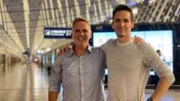 The Australian Financial Review's Michael Smith (left) and the ABC's Bill Birtles flew out of Shanghai on Monday night.