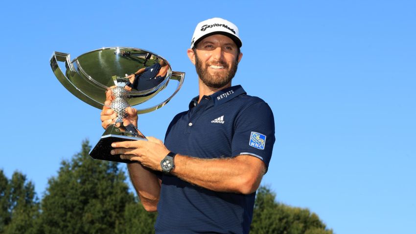 ATLANTA, GEORGIA - SEPTEMBER 07: Dustin Johnson of the United States celebrates with the FedEx Cup Trophy after winning in the final round of the TOUR Championship at East Lake Golf Club on September 07, 2020 in Atlanta, Georgia. (Photo by Sam Greenwood/Getty Images)