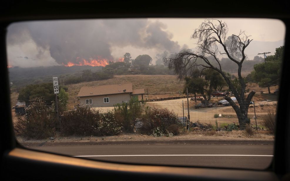 A fire encroaches Japatul Road in Jamul on September 6, 2020.