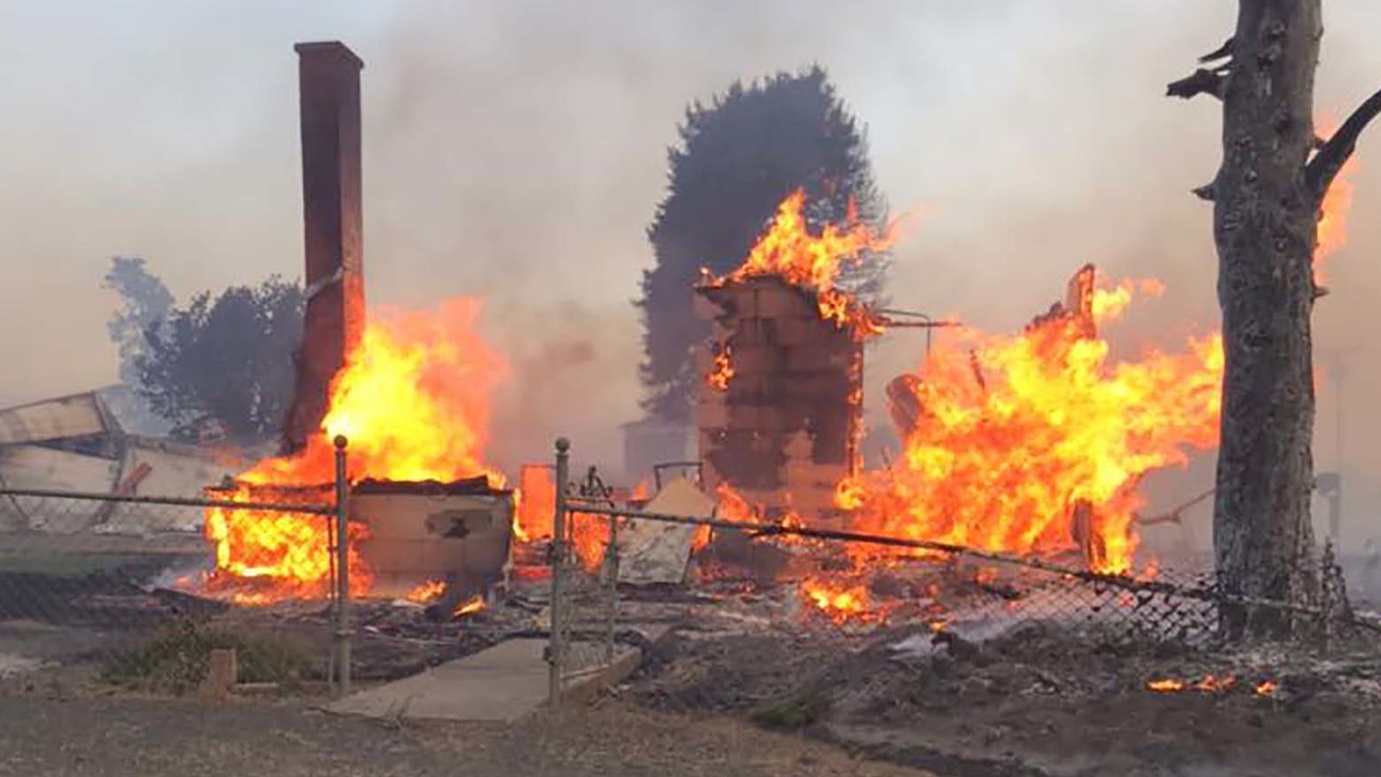 Fire eats through a building in Malden, Washington, this photo posted by the Whitman County Sheriff's Office shows.