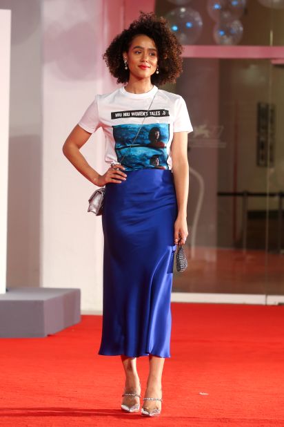"Game of Thrones" actor Nathalie Emmanuel pays tribute to women directors by wearing a Miu Miu Women's Tales t-shirt, featuring stills from director Ava DuVernay's short film "The Door." 
